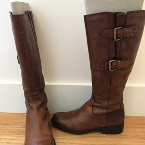 Tall brown leather boots